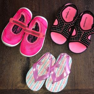 (2) pairs of water shoes + flip flops
